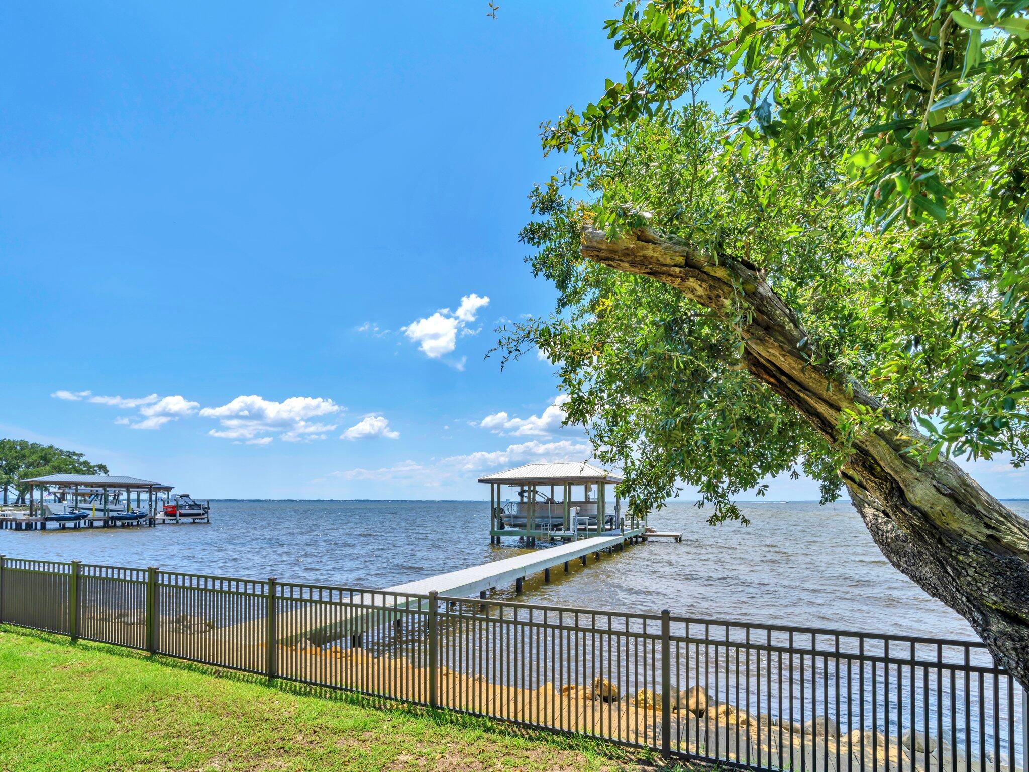 389 Driftwood Point Road Santa Rosa Beach, FL 32459 - Photo 13 of 79 a view of a terrace with a garden