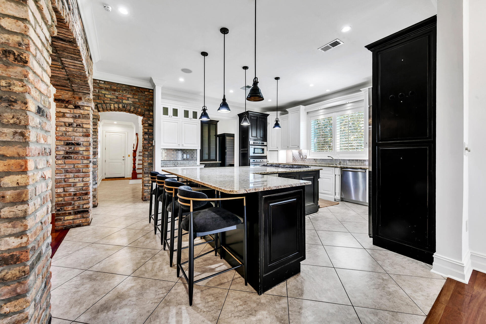389 Driftwood Point Road Santa Rosa Beach, FL 32459 - Photo 19 of 79 a kitchen with a dining table chairs and a counter top space