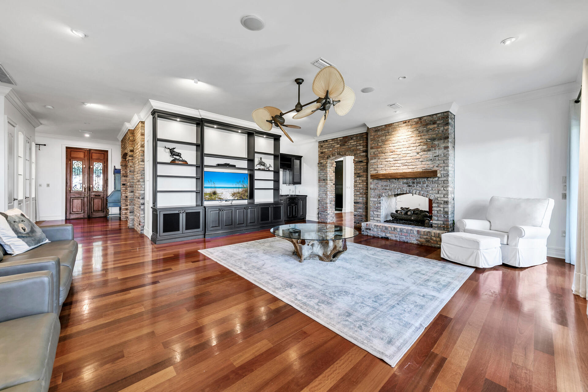 389 Driftwood Point Road Santa Rosa Beach, FL 32459 - Photo 28 of 79 a living room with dining room and wooden floor