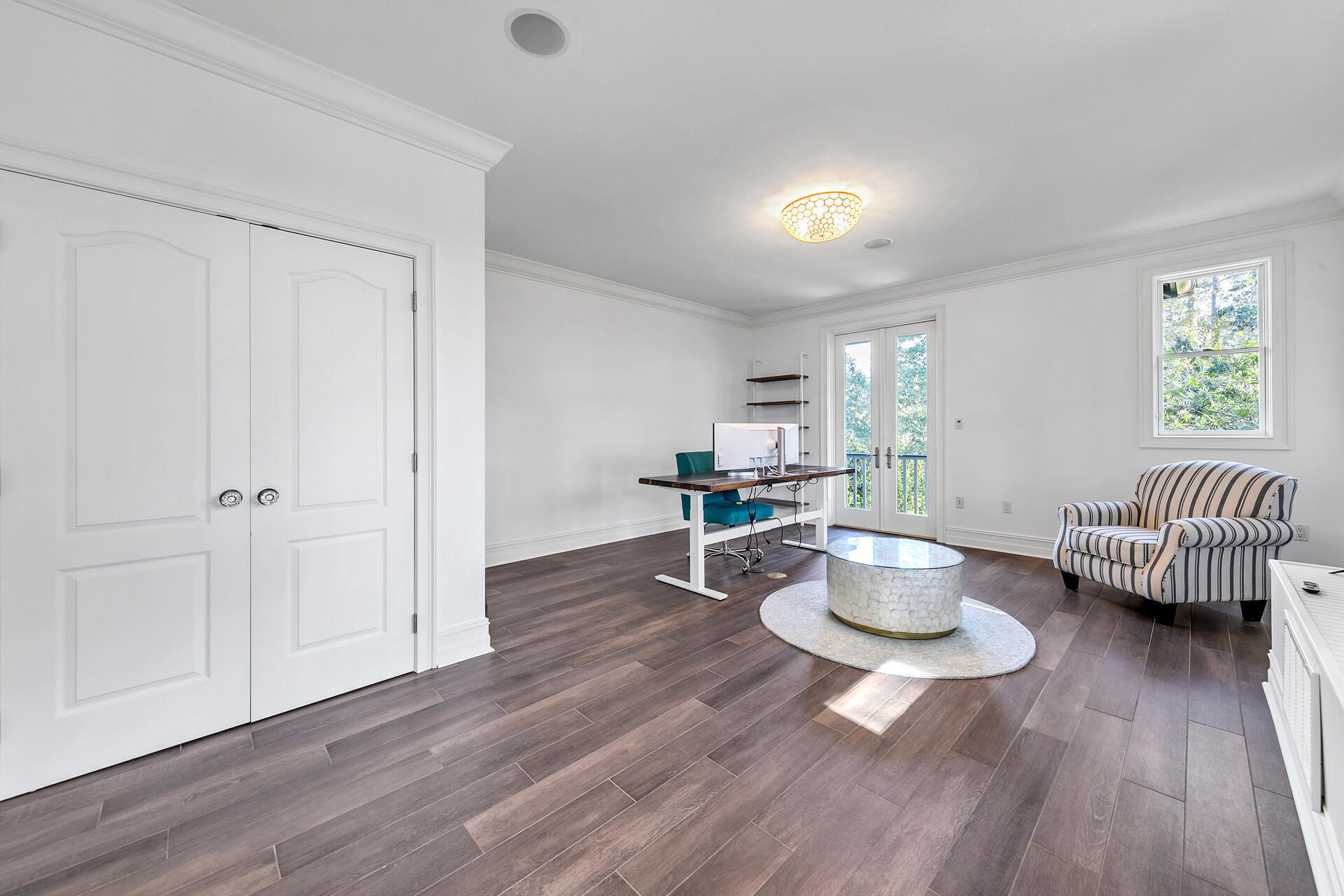 389 Driftwood Point Road Santa Rosa Beach, FL 32459 - Photo 64 of 79 a living room with furniture and a wooden floor