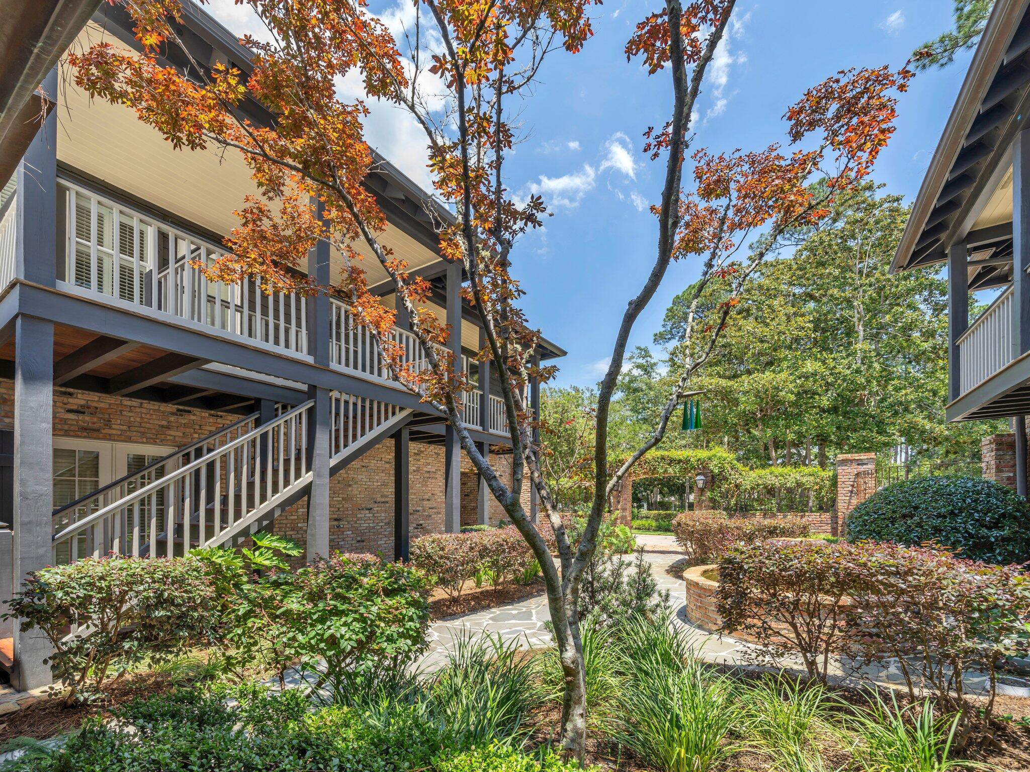 389 Driftwood Point Road Santa Rosa Beach, FL 32459 - Photo 9 of 79 a view of a house with a tree
