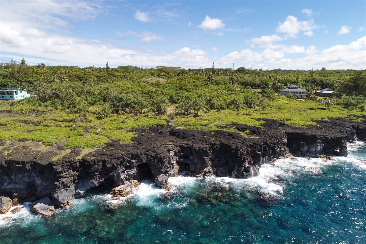 38 Government Beach Road Pahoa, HI 96778 - Photo 1 of 19 a view of a lake with houses