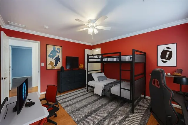 a bedroom with furniture and window