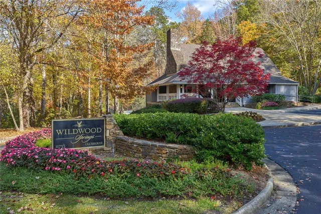 front view of a house with a garden