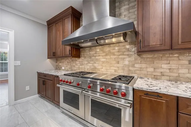 a kitchen with a stove and a microwave