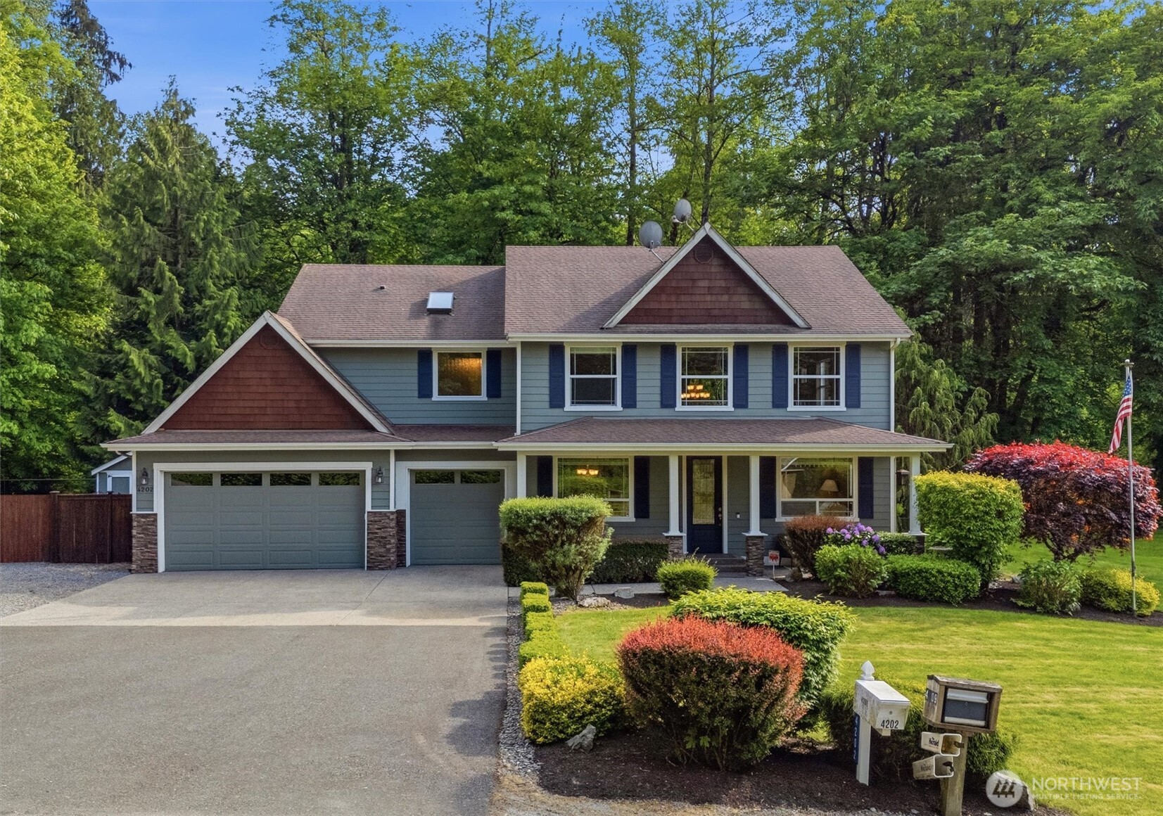 4202 Silvana Terrace Road Stanwood, WA 98292 - Photo 2 of 40 a front view of a house with garden