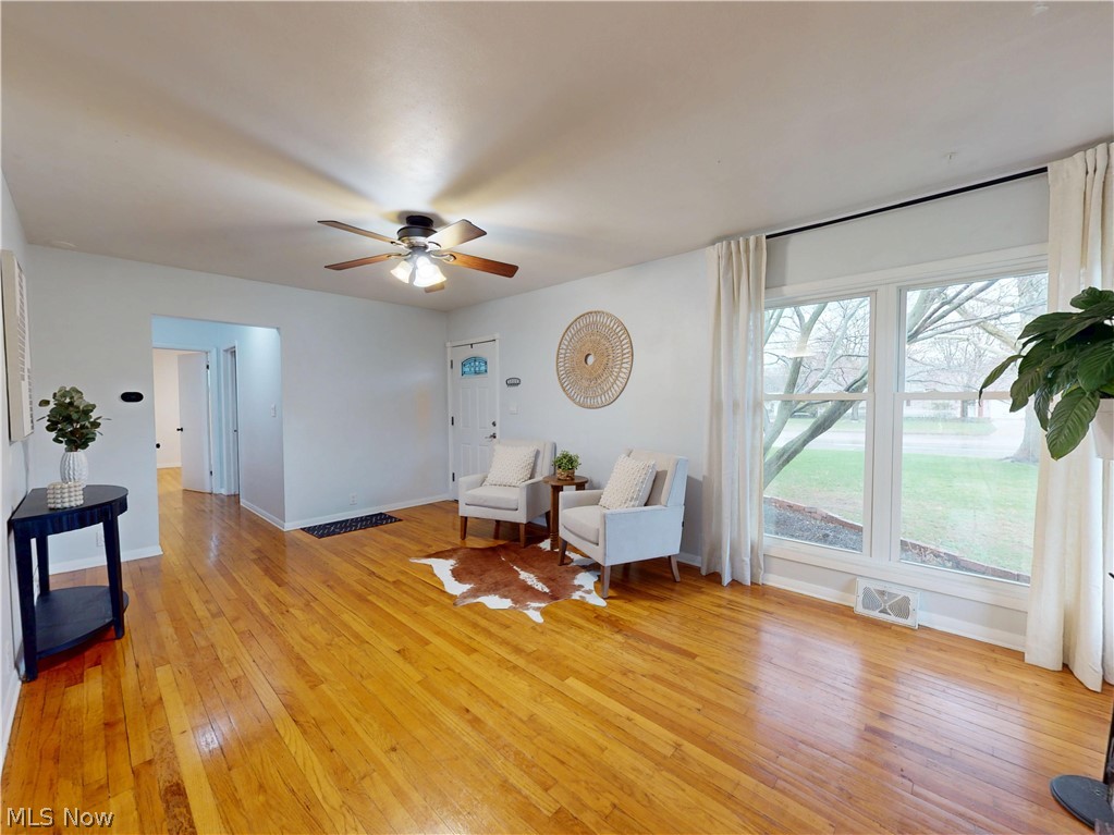 162 South Leavitt Road Amherst, OH 44001 - Photo 5 of 41 Sitting room with light wood-style floors and a ceiling fan
