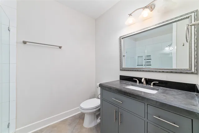 a view of parking area with parked cars