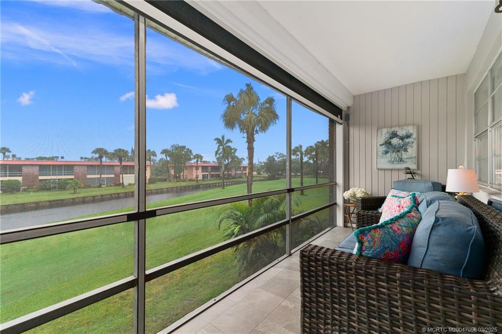 1985 Southwest Palm City Road, Unit 44I Stuart, FL 34994 - Photo 1 of 31 a balcony view with a couch