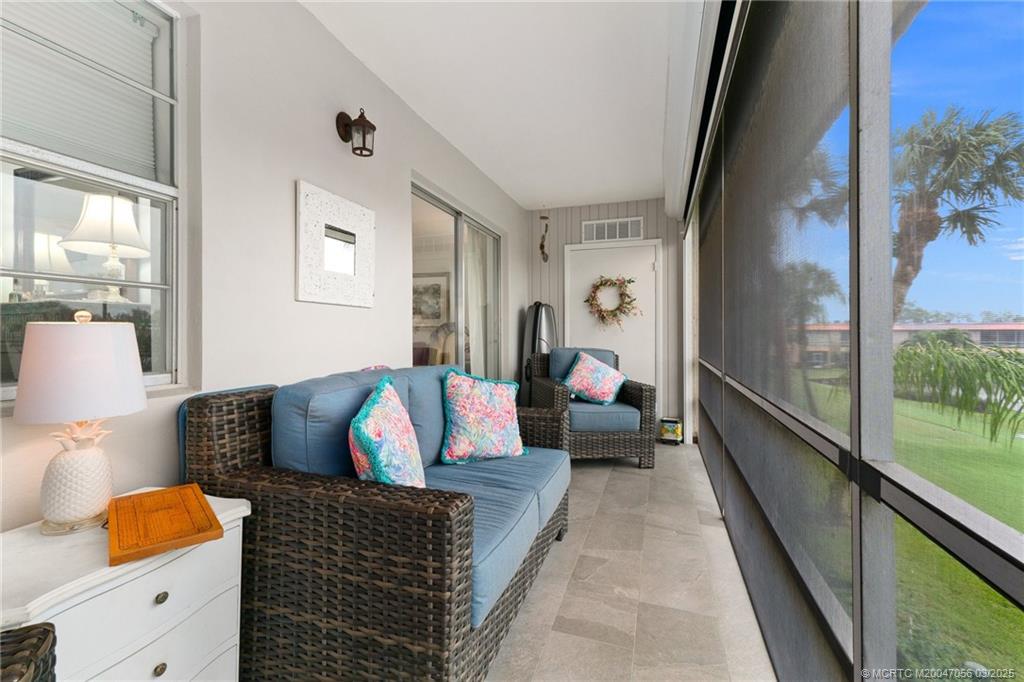 1985 Southwest Palm City Road, Unit 44I Stuart, FL 34994 - Photo 23 of 31 a living room with furniture and a couch