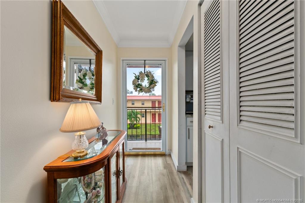 1985 Southwest Palm City Road, Unit 44I Stuart, FL 34994 - Photo 8 of 31 a view of a room with a table and a chair