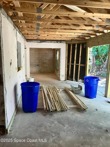 a view of patio with table and chairs