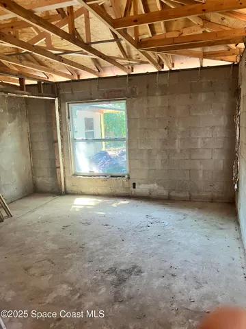 a view of a room with an empty space