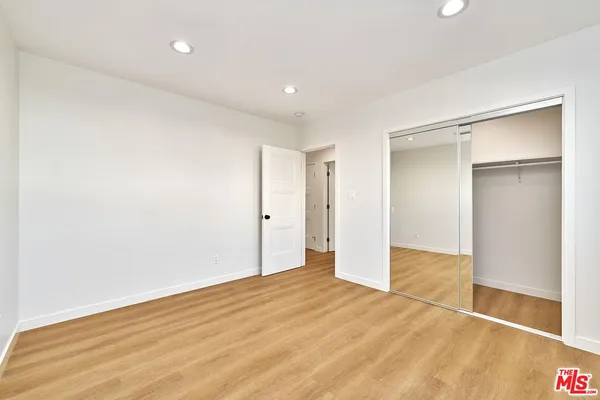 a view of a bathroom with a tub and shower