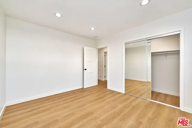 a view of a bathroom with a tub and shower