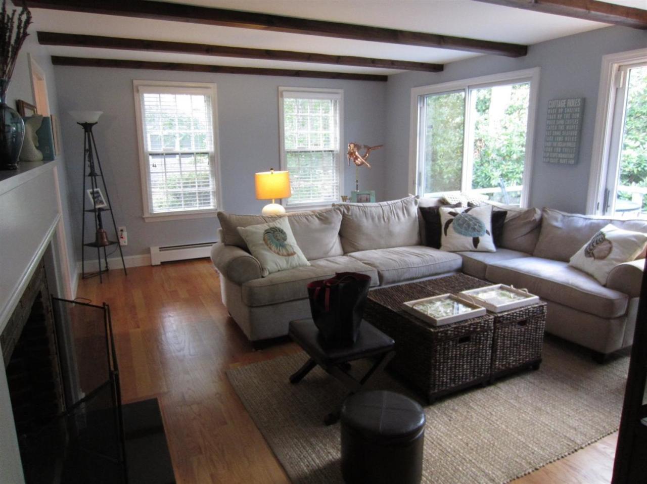 83 Potonumecot Road Chatham, MA 02633 - Photo 3 of 34 a living room with furniture and a large window