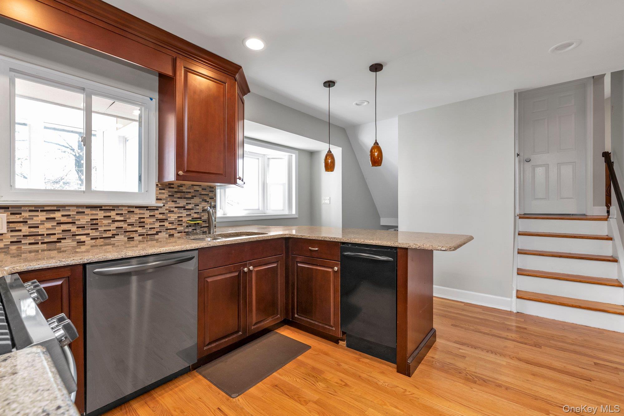 2038 Ripley Lane Merrick, NY 11566 - Photo 6 of 22 Kitchen , steps leading to upstairs