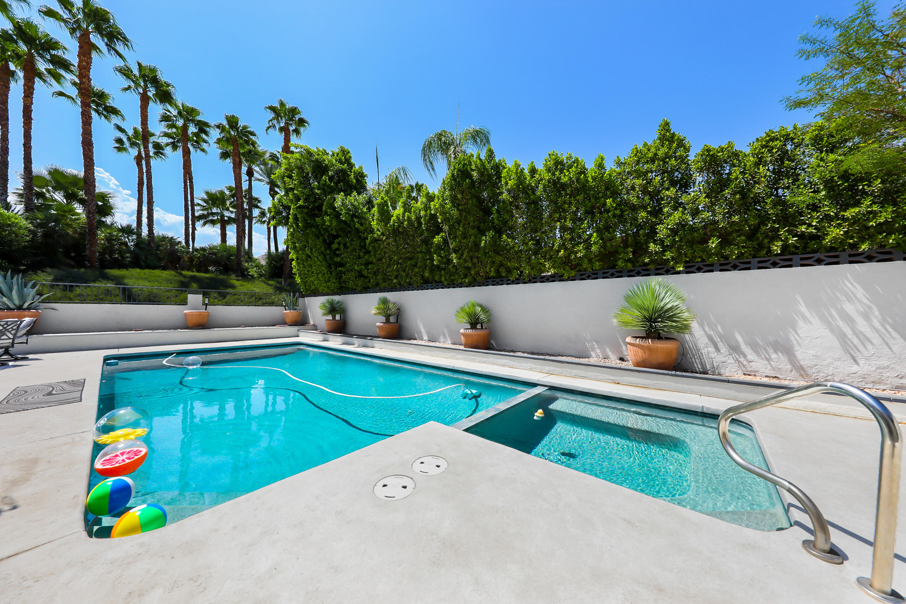 71333 Halgar Road Rancho Mirage, CA 92270 - Photo 23 of 33 swimming pool view with a seating space