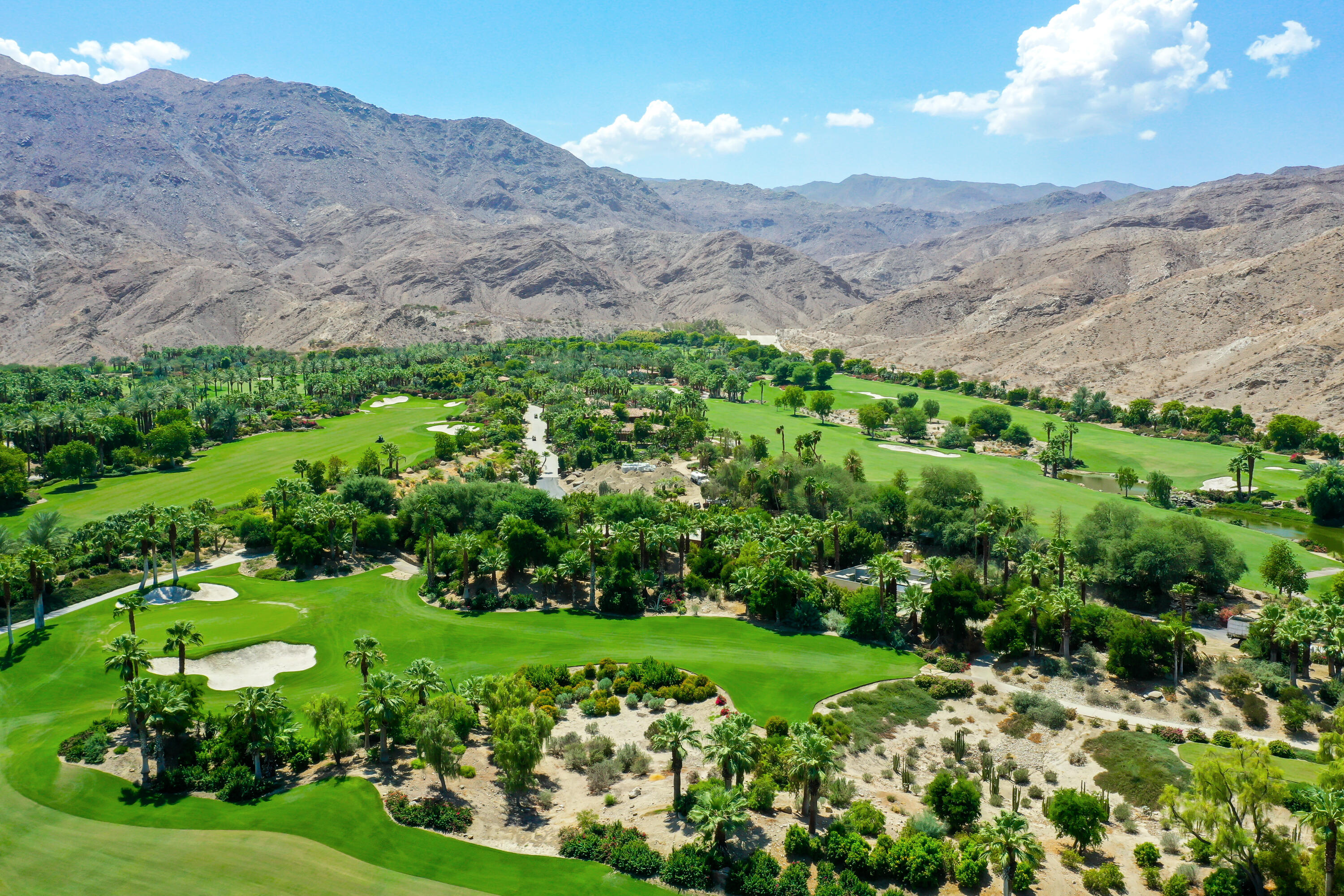 71333 Halgar Road Rancho Mirage, CA 92270 - Photo 31 of 33 a view of a lush green hillside and houses