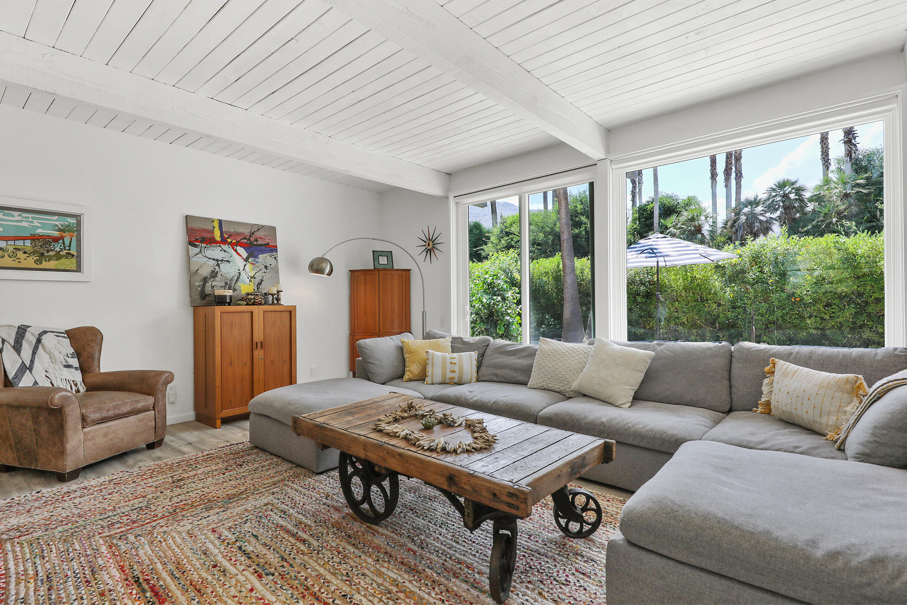 71333 Halgar Road Rancho Mirage, CA 92270 - Photo 5 of 33 a living room with furniture and a large window