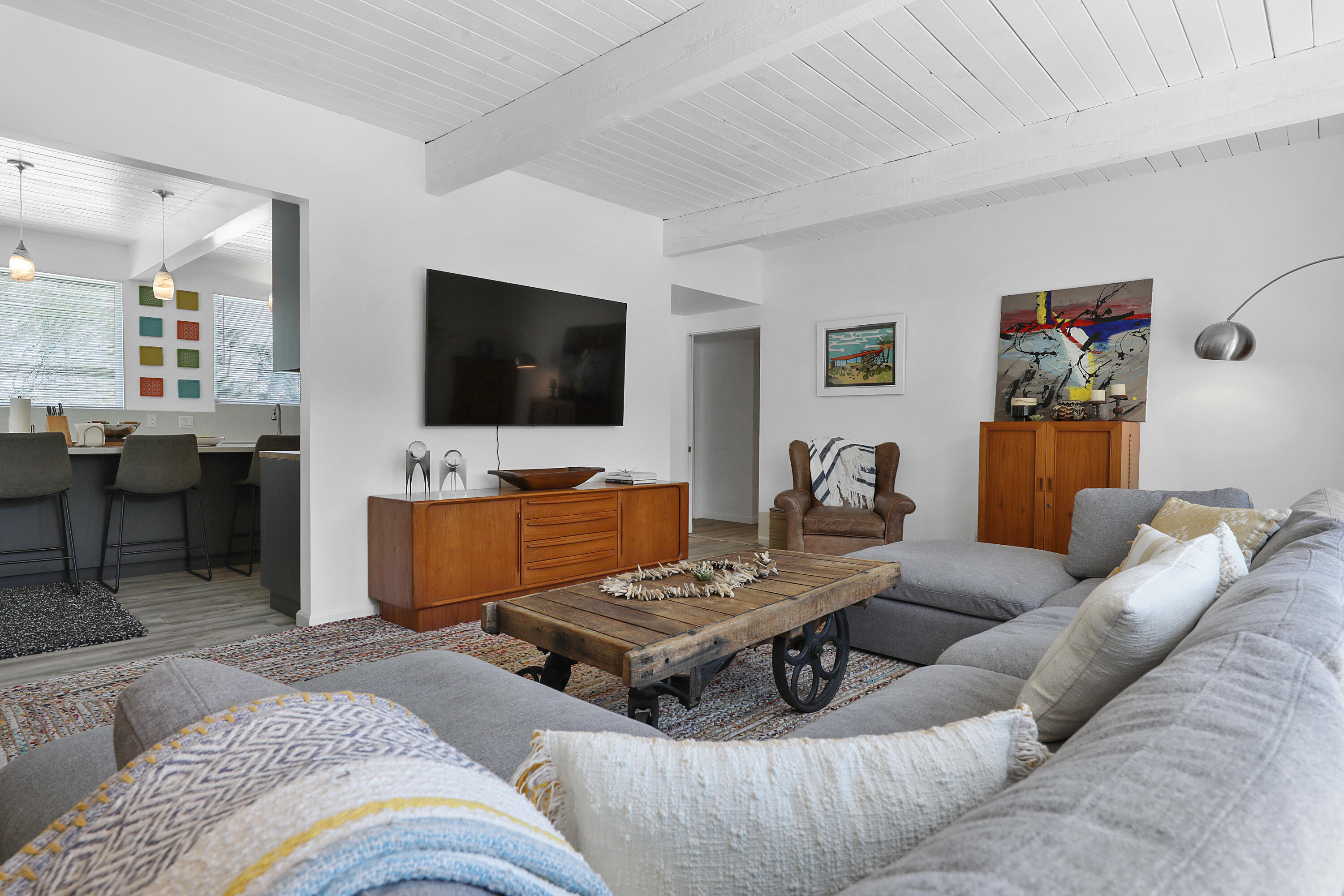71333 Halgar Road Rancho Mirage, CA 92270 - Photo 7 of 33 a living room with furniture and a flat screen tv