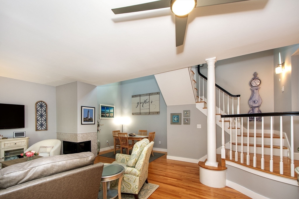 1 Gatehouse Lane, Unit 1 Hull, MA 02045 - Photo 16 of 42 a living room with furniture and a flat screen tv
