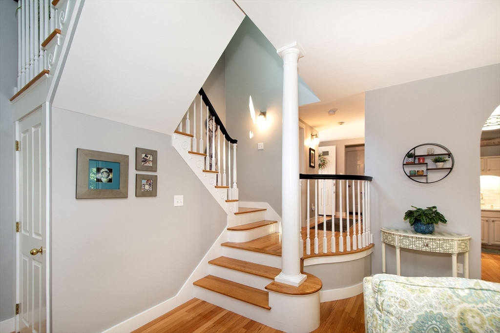 1 Gatehouse Lane, Unit 1 Hull, MA 02045 - Photo 20 of 42 a view of entryway with wooden floor and a livingroom