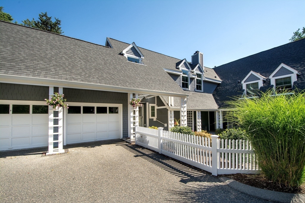 1 Gatehouse Lane, Unit 1 Hull, MA 02045 - Photo 35 of 42 a front view of a house with a yard
