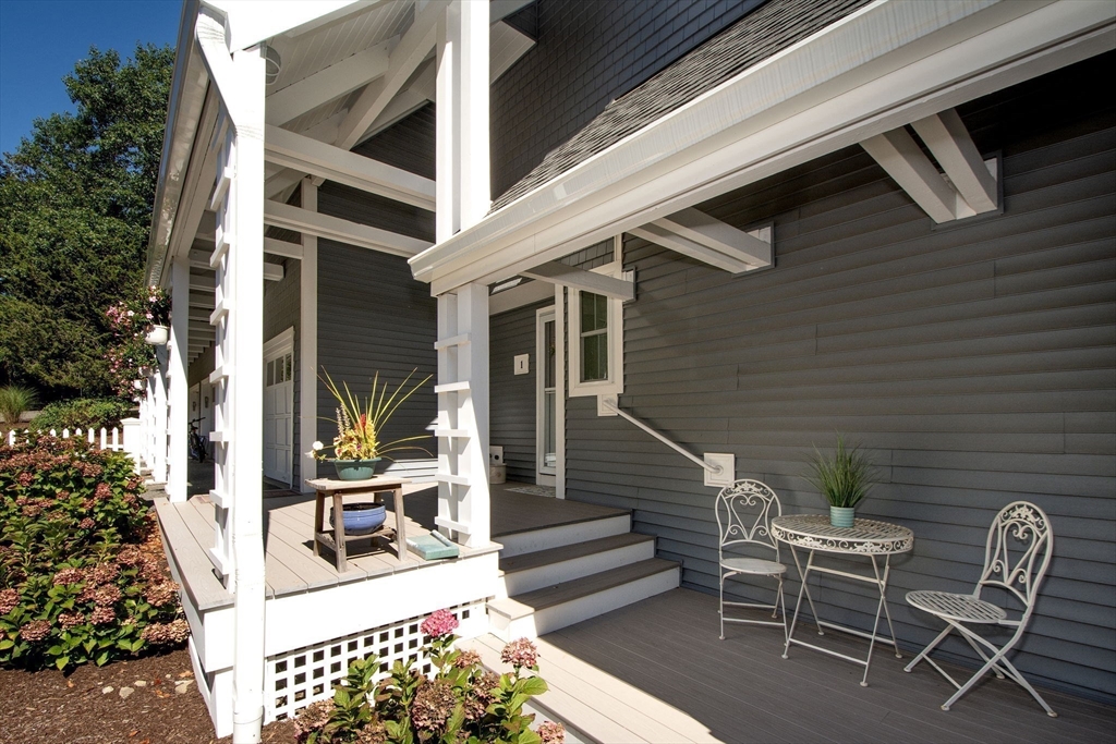 1 Gatehouse Lane, Unit 1 Hull, MA 02045 - Photo 4 of 42 a view of two chairs in the balcony