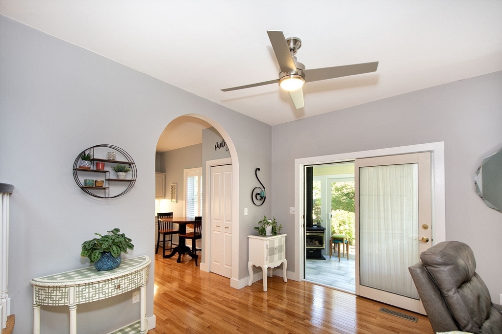 1 Gatehouse Lane, Unit 1 Hull, MA 02045 - Photo 8 of 42 a living room with furniture and a wooden floor