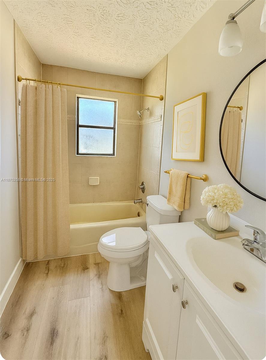 Floresta Pointe Port St. Lucie, FL 34983 - Photo 2 of 5 a bathroom with a sink a toilet and shower