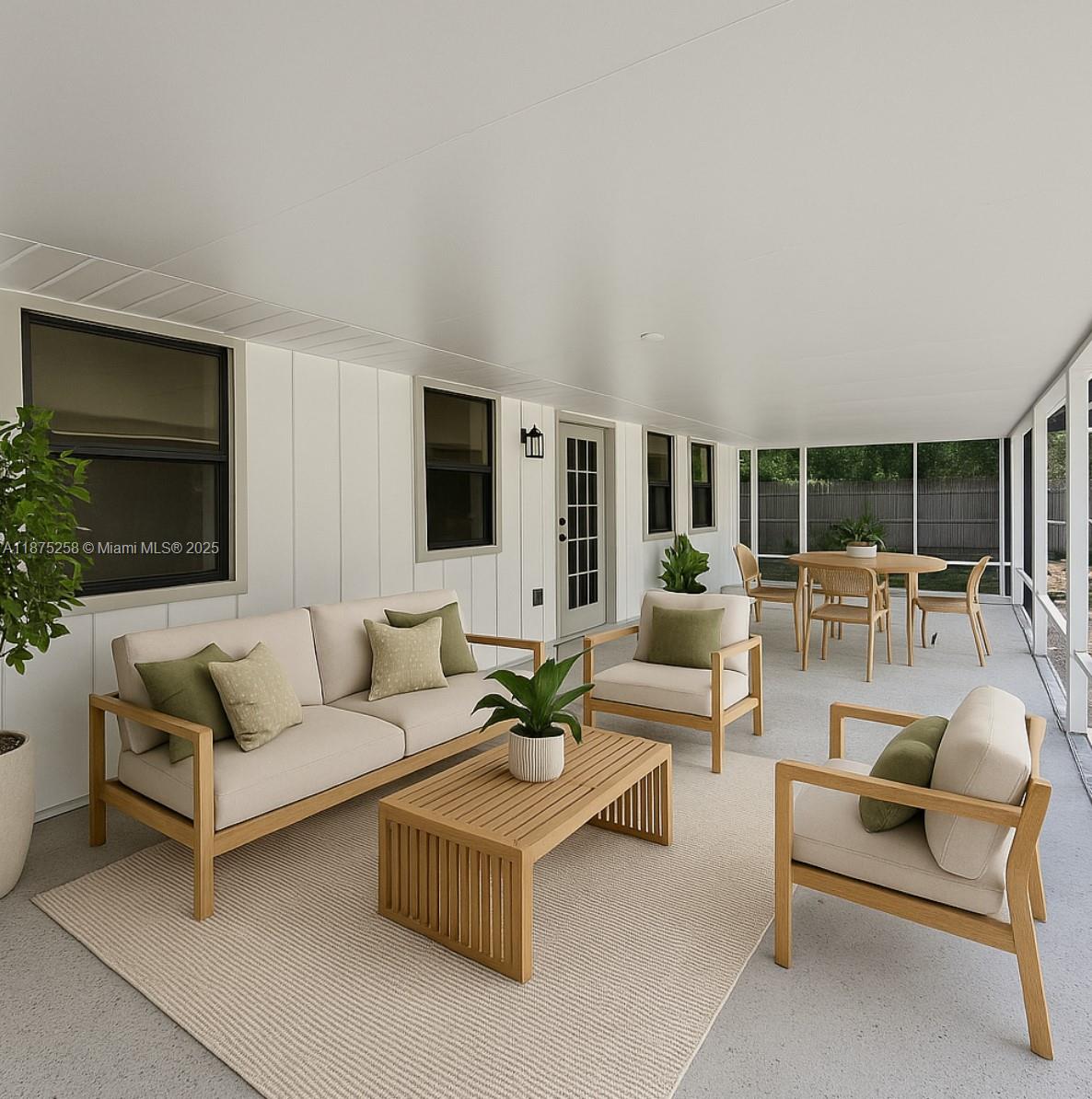 Floresta Pointe Port St. Lucie, FL 34983 - Photo 3 of 5 a living room with furniture and a flat screen tv