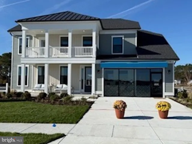 a front view of building with garage