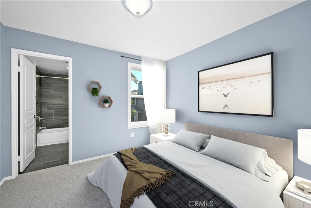 22 Valmont Way Ladera Ranch, CA 92694 - Photo 21 of 47 a bedroom with a bed and a painting on the wall