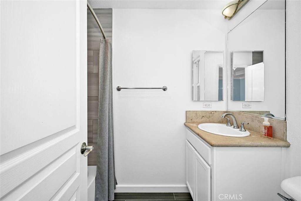 22 Valmont Way Ladera Ranch, CA 92694 - Photo 23 of 47 a bathroom with a sink and a mirror