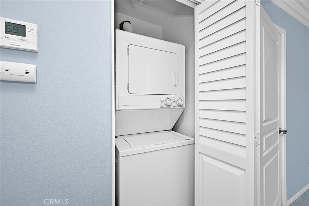 22 Valmont Way Ladera Ranch, CA 92694 - Photo 24 of 47 a utility room with dryer and washer