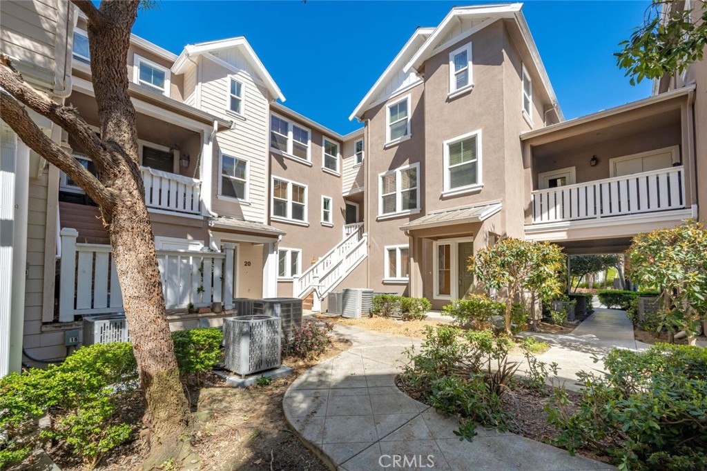 22 Valmont Way Ladera Ranch, CA 92694 - Photo 27 of 47 a view of a brick building next to a yard