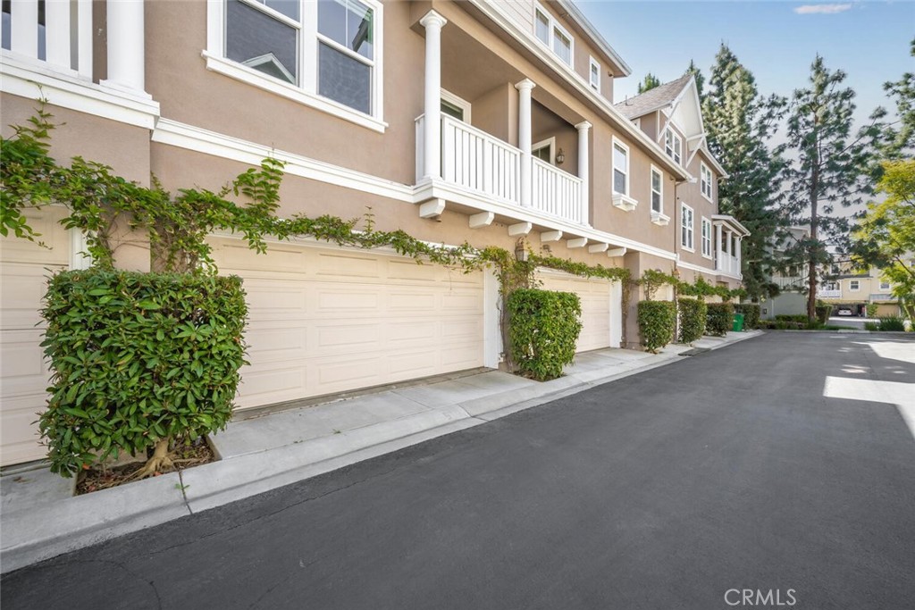22 Valmont Way Ladera Ranch, CA 92694 - Photo 31 of 47 a view of a street with a building in the background
