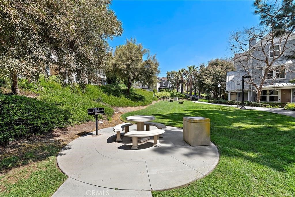 22 Valmont Way Ladera Ranch, CA 92694 - Photo 47 of 47 a white house with a yard and outdoor seating