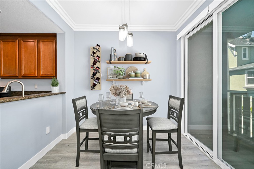 22 Valmont Way Ladera Ranch, CA 92694 - Photo 5 of 47 a view of a dining room with furniture window and wooden floor
