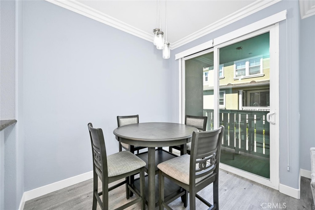 22 Valmont Way Ladera Ranch, CA 92694 - Photo 6 of 47 a view of a dining room with furniture and a window