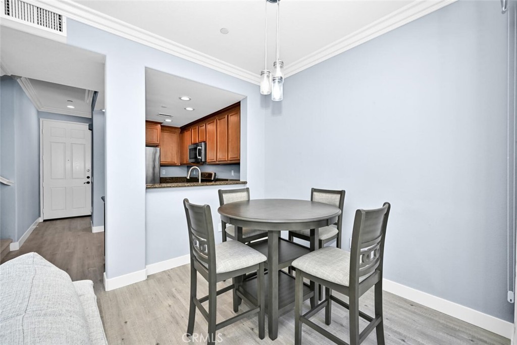 22 Valmont Way Ladera Ranch, CA 92694 - Photo 9 of 47 a view of a dining room with furniture