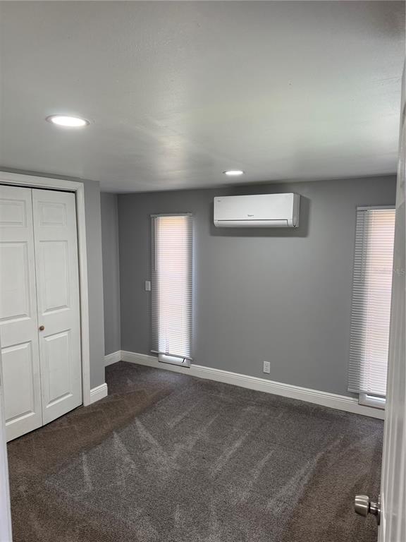 9633 Norm Street Hudson, FL 34669 - Photo 13 of 15 an empty room with windows