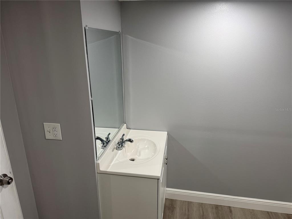 9633 Norm Street Hudson, FL 34669 - Photo 14 of 15 a utility room with dryer and washer