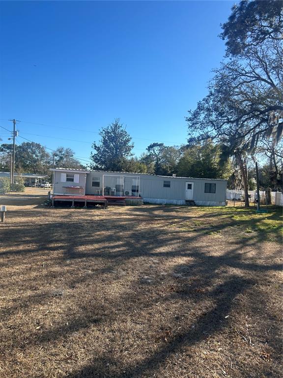9633 Norm Street Hudson, FL 34669 - Photo 2 of 15 a view of street with houses