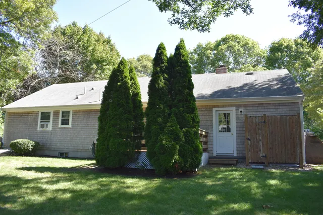 a view of backyard of a house
