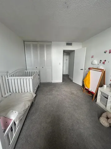 wooden floor with a bedroom