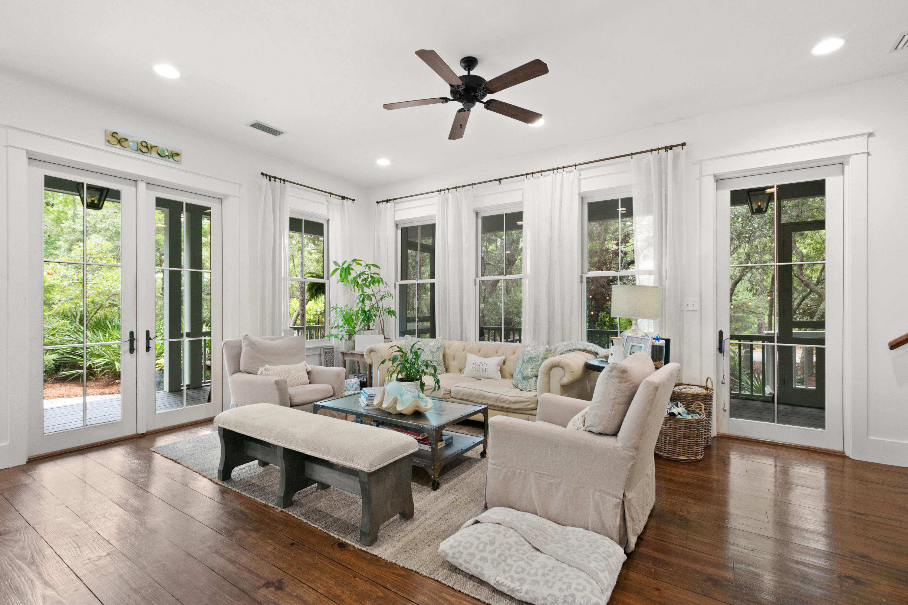 120 Hammock Lane Santa Rosa Beach, FL 32459 - Photo 13 of 57 a living room with furniture and a large window with wooden floor