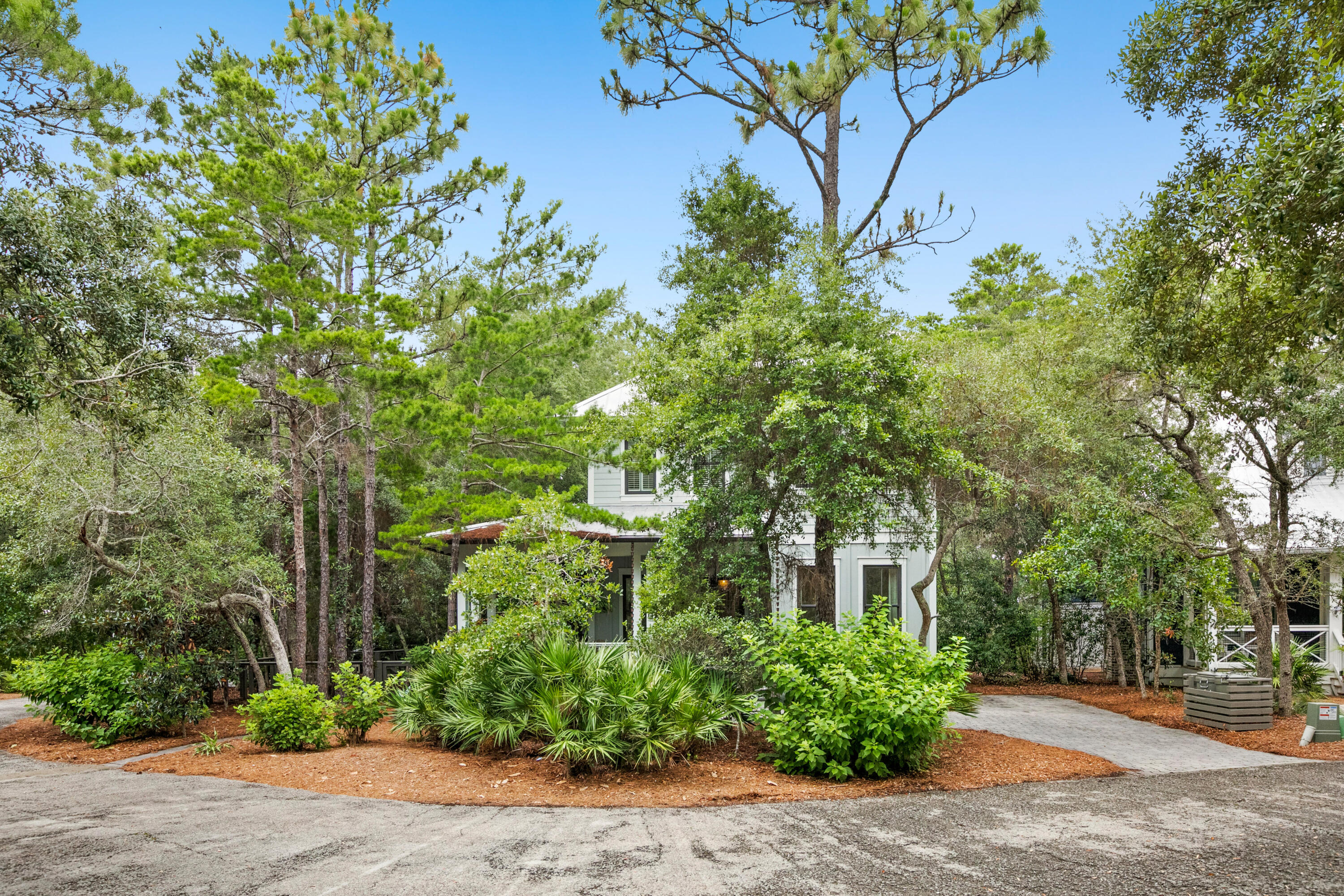 120 Hammock Lane Santa Rosa Beach, FL 32459 - Photo 3 of 57 a front view of a house with a yard
