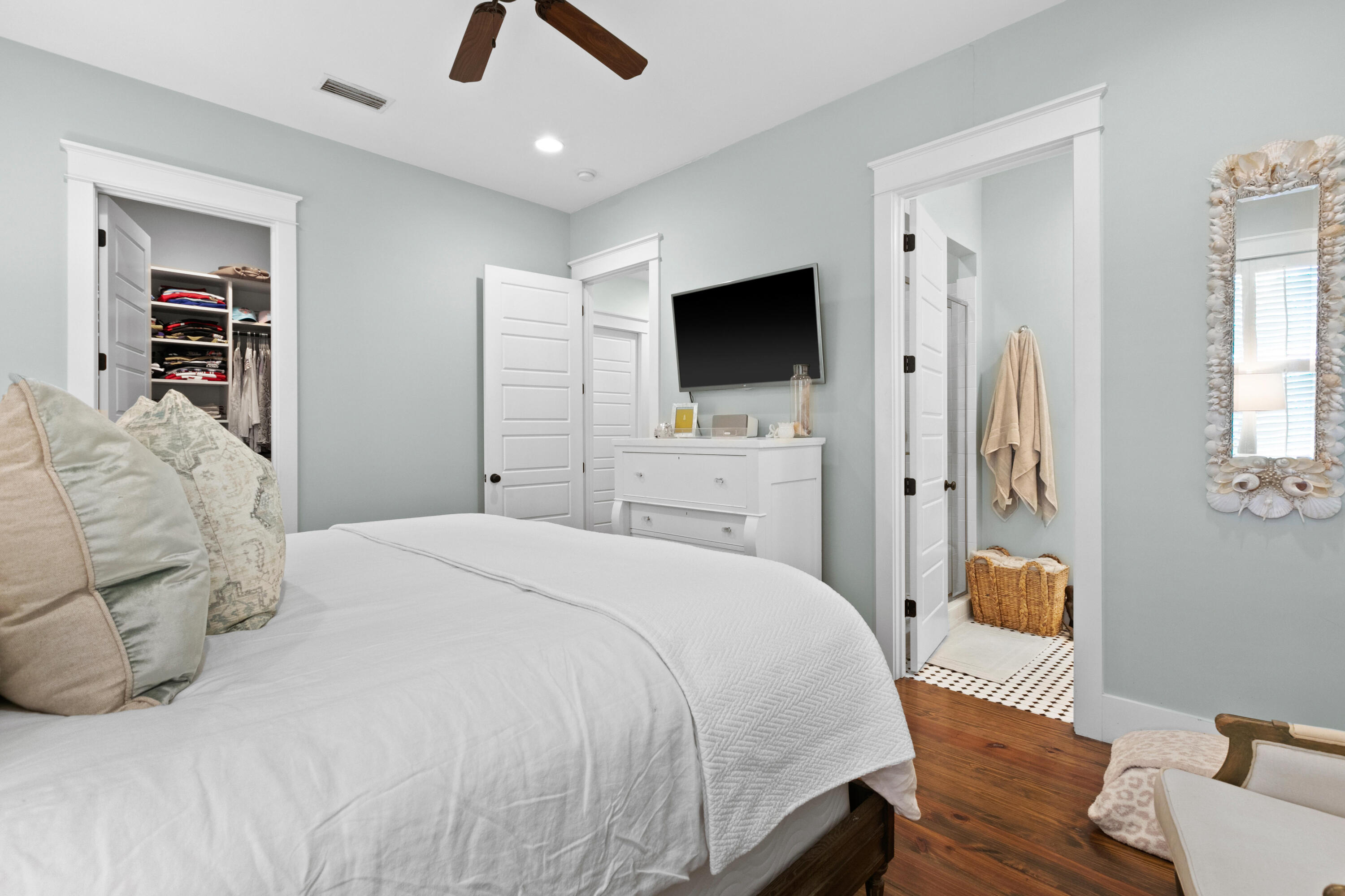 120 Hammock Lane Santa Rosa Beach, FL 32459 - Photo 35 of 57 a bedroom with a bed and a flat screen tv